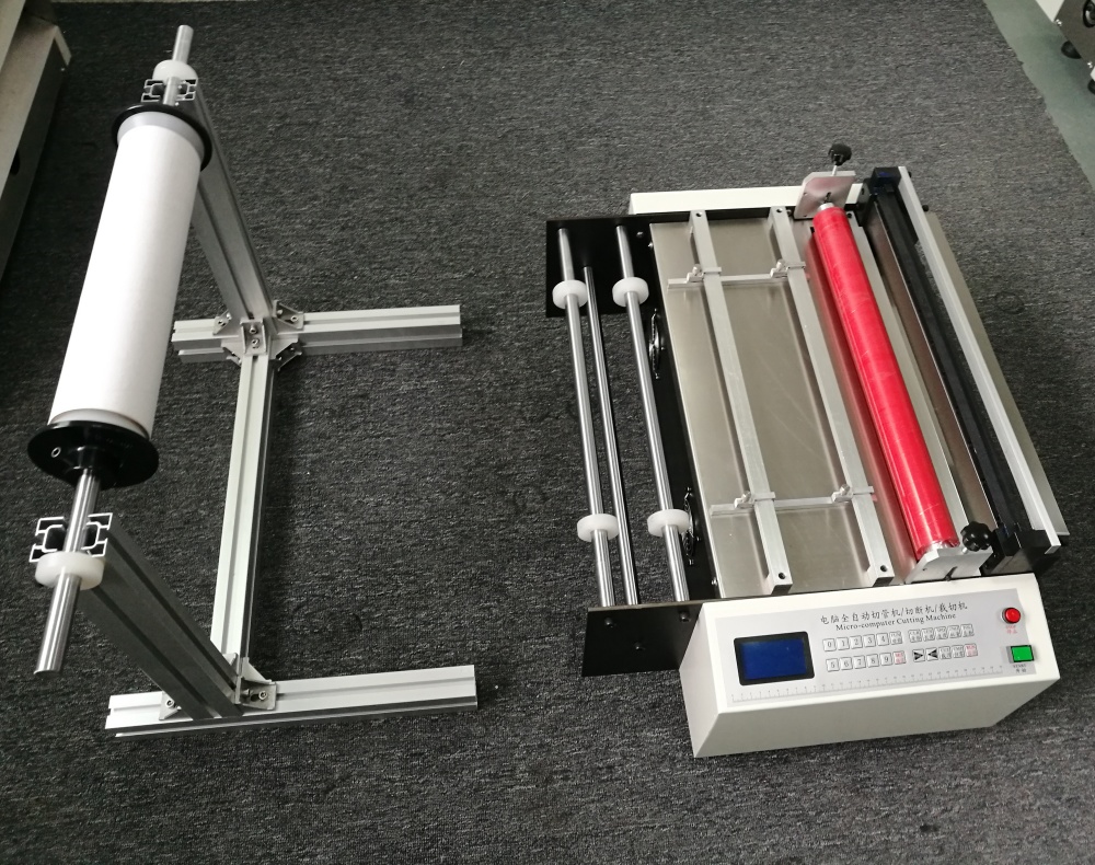 roll to sheet cutting machine