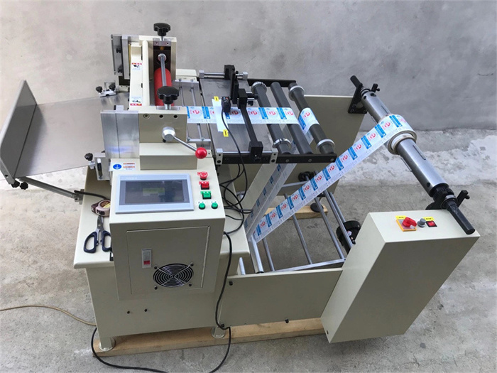 roll to sheet cutting machine